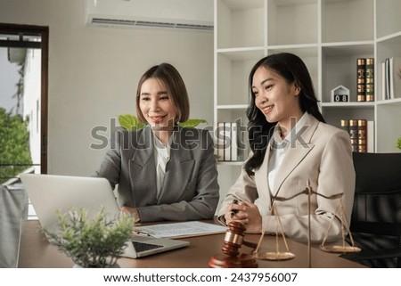 A young lawyer and businesswoman are discussing legal advice on signing a business contract. Insurance or financial contract signing
