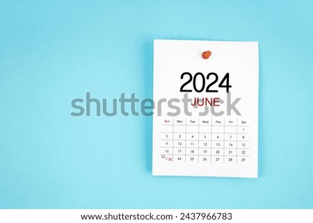 June 2024 calendar page with push pin on blue color background.
