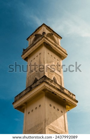 A picture of mosque tower with beautiful background 