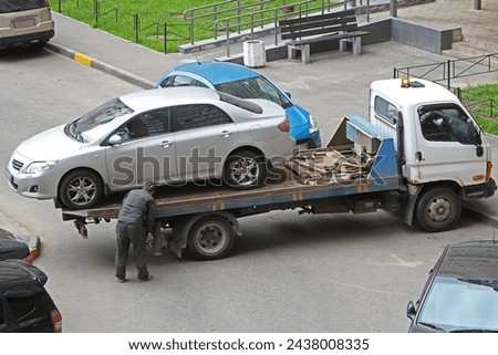 Work of a car tow truck on the street of St. Petersburg