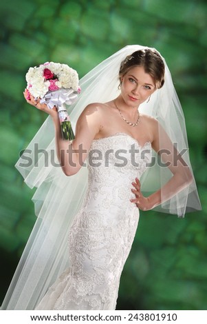 Portrait of the bride. nice view. fashion and makeup zachiska.krasyvyy bouquet.