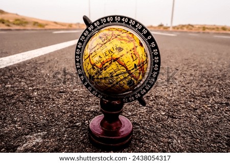 Conceptual Image Globe Earth on an Asphalt Street
