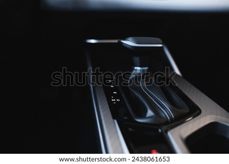Automatic transmission gearshift stick, Closeup a manual shift of modern car gear shifter Royalty-Free Stock Photo #2438061653