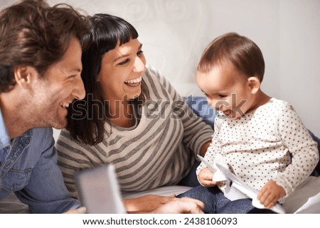 Parents, toddler and tablet for laugh in home, online and happy for funny cartoon in bedroom. Family, child development and girl for streaming entertainment, website and app for series or movie Royalty-Free Stock Photo #2438106093