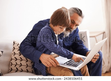 Grandfather, son and laptop in lounge with love and bonding together with cartoon in living room. Happy family, boy and computer for choice of online games, holiday and movie subscription in home