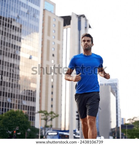 Fitness, health and man running in city training for marathon, competition or race. Exercise, wellness and male athlete with outdoor cardio workout for endurance, energy or speed in urban town Royalty-Free Stock Photo #2438106739