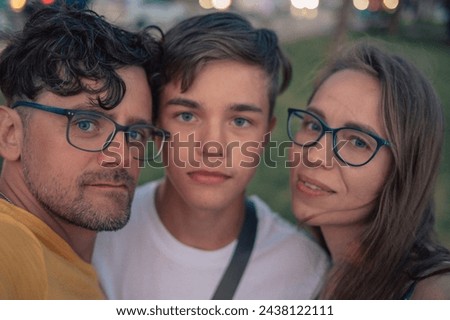 Happy family taking a photo in Alanya city, Turkey. Travelling or vacation concept