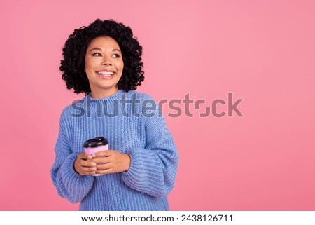 Photo of sweet pretty lady dressed knitted sweater drinking tea to go looking empty space isolated pink color background