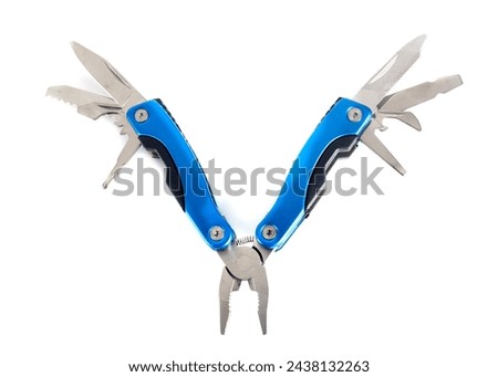 Swiss army knife in front of white background