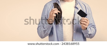 cropped photo of man with payment card. man with payment card and wallet