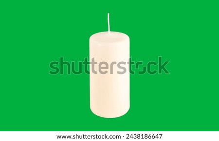 White candle on green screen 