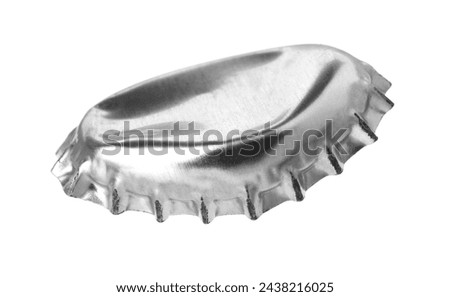 One silver beer bottle cap isolated on white Royalty-Free Stock Photo #2438216025