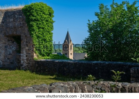 The view from the Ulmen castle ruins to the St. Matthias Church Royalty-Free Stock Photo #2438230053