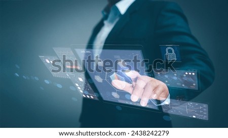 Concept artificial intelligence Data analysis business analytics internet technology. Businessman hand touch on virtual screen KPI Dashboard
analyzing financial graph, economic graph growth chart.  Royalty-Free Stock Photo #2438242279