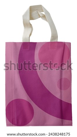 a beige polypropylene tote bag with purple curved and rounded stripes or motifs isolated on a white background. nonwoven. environmentally friendly bag