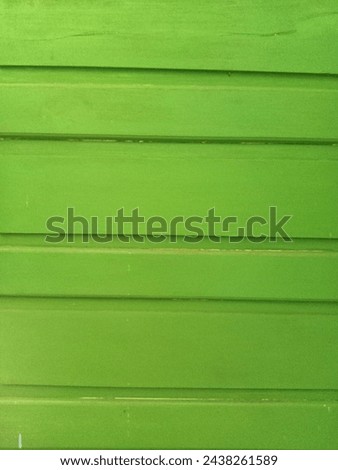 green background with symmetrical shapes Royalty-Free Stock Photo #2438261589