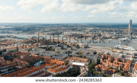 Gothenburg, Sweden. River Gota-Alv. Panoramic view of the central part of the city. Summer day. Cloudy weather, Aerial View   Royalty-Free Stock Photo #2438285363