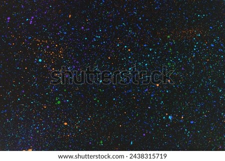 Abstract multicolored explosion on a black background. Design element.