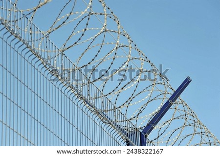 barbed wire on the fence of a protected facility in Moscow