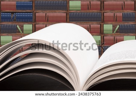 Books on the table in the library, against the background of wooden cabinets with books. Back to school. Education background. Copy Space