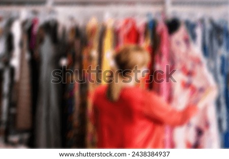 Asian woman goes to supermarket to buy supplies.
stock photo with blurred background