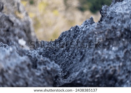 selective focus mountain rocks look strong but feel light and airy rock wall background image
