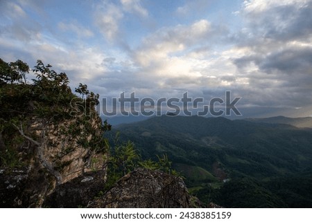 mountain landscape on a high cliff in Thailand See fertile mountains and many clouds in the sky. The cool wind blows and refreshes the heart.