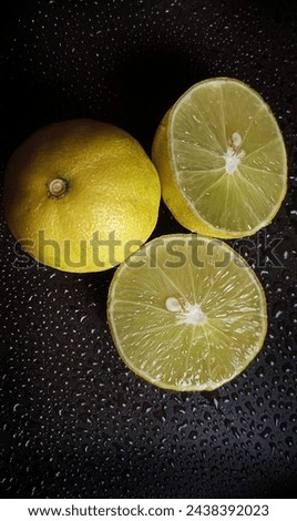 Lemon with water drops wallpaper image
