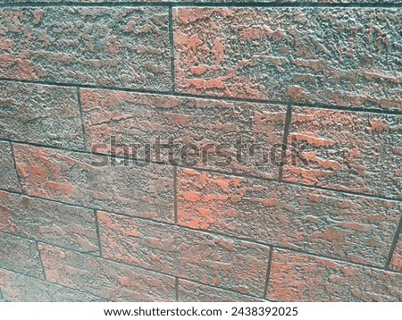 Stunning close-up of Cladding stones or tiles glued onto the wall surface for elegant look with details ultrahd hi-res jpg stock image photo picture selective focus horizontal background side view

