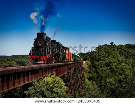 "High-speed train with luxurious amenities, comfortable seating." Royalty-Free Stock Photo #2438393405