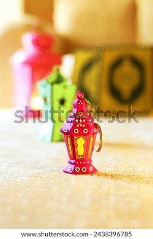 Image of small Ramadan Lanterns with an Islamic background. Called "Fanoos" in Arabic language. Royalty-Free Stock Photo #2438396785