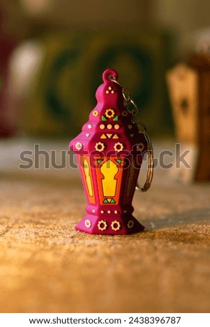 Image of small Ramadan Lanterns with an Islamic background. Called "Fanoos" in Arabic language. Royalty-Free Stock Photo #2438396787