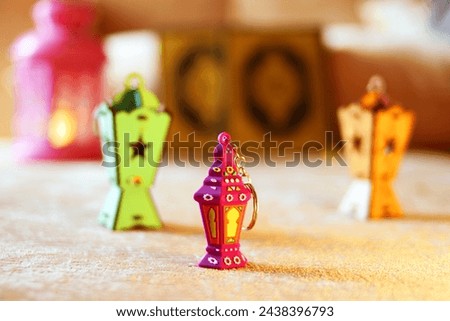 Image of small Ramadan Lanterns with an Islamic background. Called "Fanoos" in Arabic language. Royalty-Free Stock Photo #2438396793