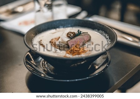 Exquisite Duck Breast with Creamy Soup Ramen noodle and Crispy Toppings