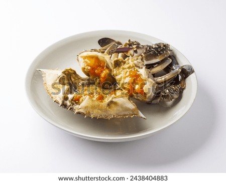Close-up of Ganjang-gejang(Soy Sauce Marinated Crabs) in pieces on dish and white floor, South Korea
 Royalty-Free Stock Photo #2438404883