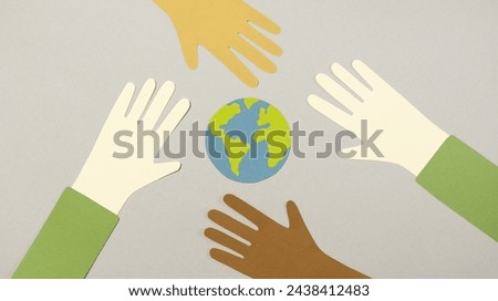 Hand Cutouts and an Earth Cutout