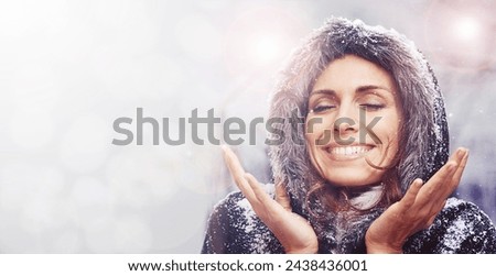 Nature, happy and face of woman with snow for season on vacation or holiday in woods. Travel, mockup and excited female person with snowflake for cold climate on winter weekend trip in forest. Royalty-Free Stock Photo #2438436001