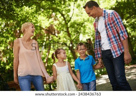 Happy, family and walk in park holding hands on vacation with care and support from parents for children. Mother, father and kids smile in forest in summer or adventure on holiday together in woods