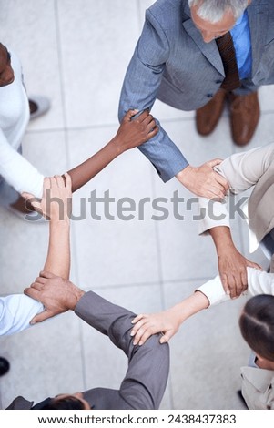 Business people, above and arm circle in office in support for teamwork, collaboration or partnership. Corporate, solidarity or team with elbow link for mission unity, trust or workflow efficiency
