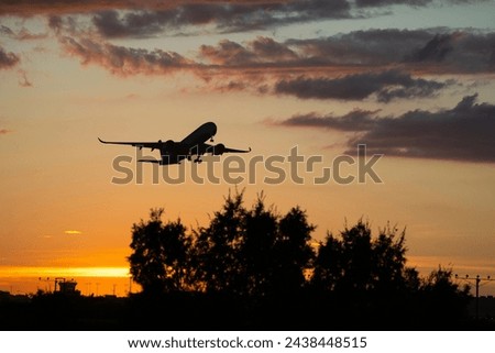 Beautiful airplane going on a trip Royalty-Free Stock Photo #2438448515