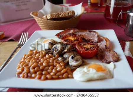 A sumptuous English break fast fresh from the kitchen  Royalty-Free Stock Photo #2438455539