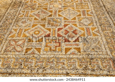 Large panoramic view of Mosaic floor of a Byzantine church. Khirbet Beit Lei or Beth Loya at Judean lowlands, Israel Royalty-Free Stock Photo #2438464911