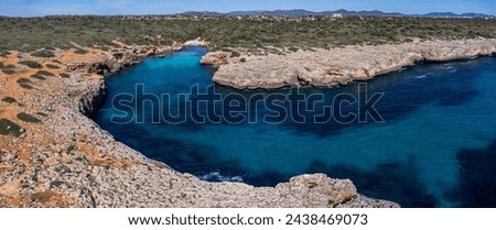 turquoise waters in Cala Petita, Porto Cristo, coast of Manacor, Majorca, Balearic Islands, Spain