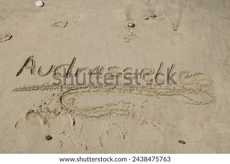 Written word audresselles in the sand at the beach audresselles in france