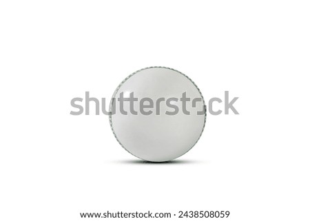 A regular red leather cricket ball on an isolated white background
