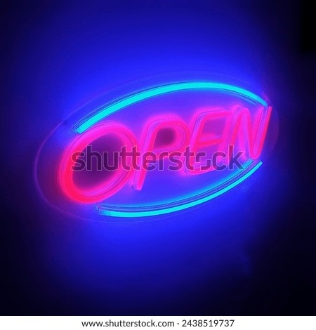 Retro neon OPEN sign in dark room