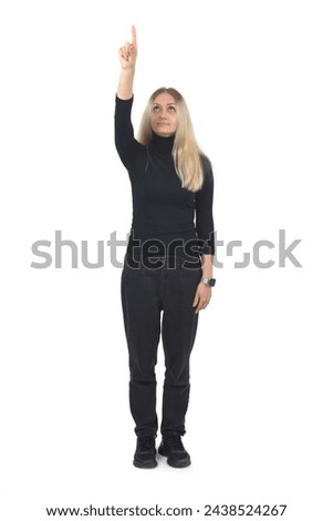 front view of a blonde woman pointing finger up on white background