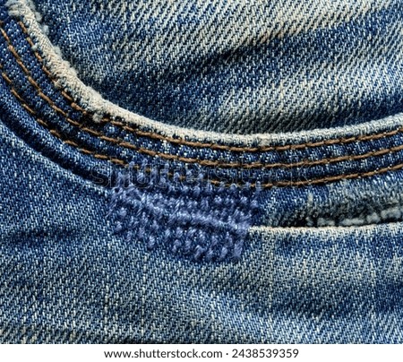 Pocket on denim texture. Stock photo of high quality fabric.