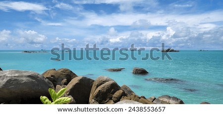 Beautiful beach and lanscape in Tanjung Pesona Royalty-Free Stock Photo #2438553657