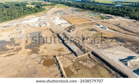 Drone aerial photograph of earthworks at a new construction site in the Nepean Business Park in the greater Sydney suburb of Penrith in New South Wales in Australia Royalty-Free Stock Photo #2438579707